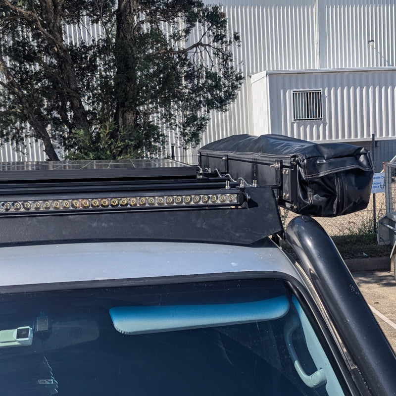 Low profile bracket for 270° awning